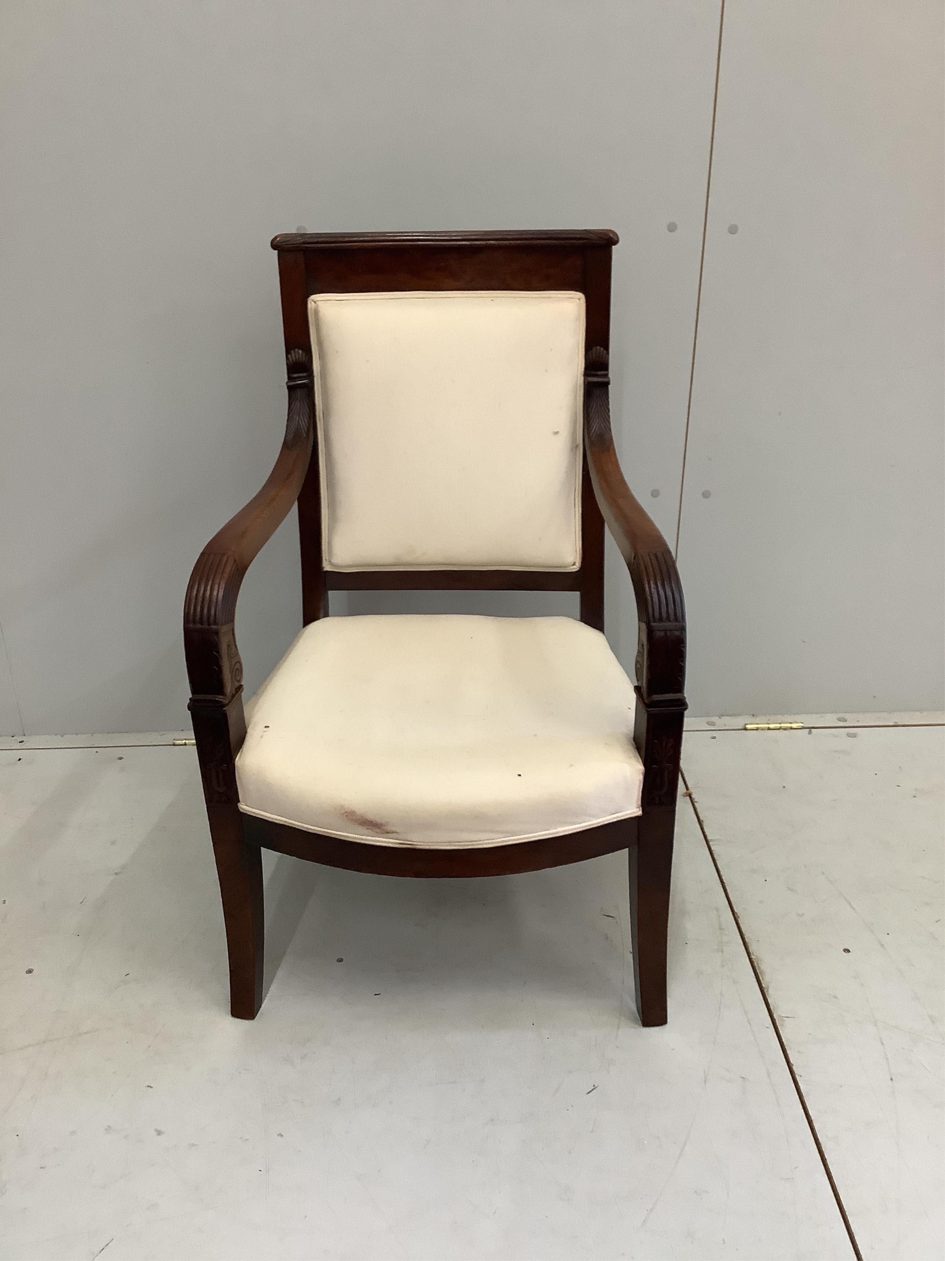 A French Empire upholstered mahogany settee, width 176cm, depth 60cm, height 92cm and a similar fauteuil. Condition - good